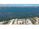 Beautiful aerial view of the waterfront property surrounded by lush greenery and scenic water views at 5041 N Beach Rd # 2A And 2B, Englewood, FL 34223