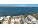 Beautiful aerial view of the waterfront property surrounded by lush greenery and scenic water views at 5041 N Beach Rd # 2A And 2B, Englewood, FL 34223