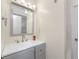 Bathroom features a vanity and a door at 5041 N Beach Rd # 2A And 2B, Englewood, FL 34223