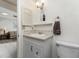 This bathroom has a single sink vanity and nautical accents at 5041 N Beach Rd # 2A And 2B, Englewood, FL 34223