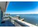 Scenic water view from the deck featuring a private dock and boat lift at 5041 N Beach Rd # 2A And 2B, Englewood, FL 34223