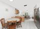 Kitchen featuring a dining table and open access to the living area at 5041 N Beach Rd # 2A And 2B, Englewood, FL 34223