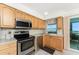 A well-maintained kitchen features appliances and cabinet space at 5041 N Beach Rd # 2A And 2B, Englewood, FL 34223