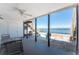 Spacious covered patio perfect for entertaining with lovely views of the water at 5041 N Beach Rd # 2A And 2B, Englewood, FL 34223