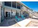 Inviting patio area with outdoor seating and access to waterfront views at 5041 N Beach Rd # 2A And 2B, Englewood, FL 34223