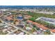 Aerial view of community featuring lush landscaping, pool and ponds in desirable location at 507 Pine Hollow Cir # 507, Englewood, FL 34223