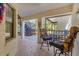 Outdoor patio featuring stone floors, comfortable seating, and lots of shade at 507 Pine Hollow Cir # 507, Englewood, FL 34223