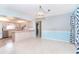 Eat-in kitchen with stainless steel appliances, breakfast bar, and light wood cabinets at 6206 Marcum St, Englewood, FL 34224