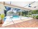Screened-in pool area provides a private oasis for relaxation and recreation at 6206 Marcum St, Englewood, FL 34224