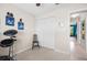 Clean bedroom with white wood flooring, a large closet, and a drumset at 6417 Klaus Ct, Port Charlotte, FL 33981