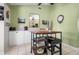 Kitchen coffee bar island with seating for four, with view to the kitchen at 6417 Klaus Ct, Port Charlotte, FL 33981