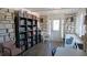 The community library features books, tables, and chairs with natural light at 6417 Klaus Ct, Port Charlotte, FL 33981