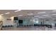 The community meeting room with large tables, a stage, and plenty of seating at 6417 Klaus Ct, Port Charlotte, FL 33981