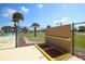 Outdoor shower area that helps residents to wash off the sand after swimming in the pool at 6461 Thorman Rd, Port Charlotte, FL 33981