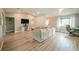 Spacious living area featuring wood floors, modern furnishings, and great natural light at 7234 Mamouth St, Englewood, FL 34224