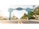 Charming street view with the Dearborn Street sign and lush greenery, welcoming visitors to Englewood at 7234 Mamouth St, Englewood, FL 34224