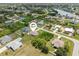 An aerial view showing the layout of a house, its surroundings, and the community at 7393 Mamouth St, Englewood, FL 34224