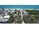 Aerial view showcasing beach proximity and neighborhood at 95 Coquina Ln, Englewood, FL 34223