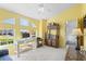 Sunlit office with a desk and storage, offering a comfortable and productive workspace at 116 Tournament Rd, Rotonda West, FL 33947
