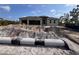 New construction home showing block structure, two-car garage, and dirt lot at 13529 Boatbill Ln, Port Charlotte, FL 33981