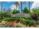 Landscaped IslandWalk entrance sign adding natural beauty to the community at 13859 Vadini St, Venice, FL 34293