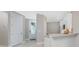 Open-concept living area seamlessly connects the kitchen and foyer, creating an inviting and spacious layout at 13859 Vadini St, Venice, FL 34293