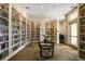 The library is a quiet space filled with books, a table, and comfortable seating at 13859 Vadini St, Venice, FL 34293