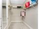 Functional walk-in closet featuring carpet floors, multiple wire shelves for optimal storage and organization at 13859 Vadini St, Venice, FL 34293
