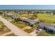 Aerial view of home highlighting it's location on a quiet street at 146 Rotonda Cir, Rotonda West, FL 33947