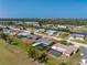 Aerial view of home on a canal offering views of the surrounding community at 146 Rotonda Cir, Rotonda West, FL 33947