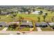 Charming single-story home with a screened lanai, lush landscaping and access to a golf course and pond at 146 Rotonda Cir, Rotonda West, FL 33947
