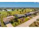Aerial view of home with beautiful golf course views at 146 Rotonda Cir, Rotonda West, FL 33947