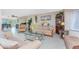 Comfortable living room showcasing tile flooring, and plentiful seating for gatherings at 146 Rotonda Cir, Rotonda West, FL 33947