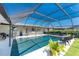 Gorgeous screened-in pool area with multiple seating options, perfect for enjoying sunny days and outdoor gatherings at 146 Rotonda Cir, Rotonda West, FL 33947