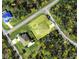Aerial view of home on oversized lot in a quiet neighborhood at 15417 Hanley Ct, Port Charlotte, FL 33953