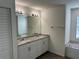 Bathroom features a double granite vanity, tub and shower at 15417 Hanley Ct, Port Charlotte, FL 33953