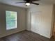 Inviting bedroom featuring luxury vinyl floors, a window, and closet at 15417 Hanley Ct, Port Charlotte, FL 33953
