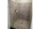Beautiful walk-in shower with granite trim and tiled walls at 15417 Hanley Ct, Port Charlotte, FL 33953