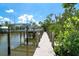 Home features a private dock with boat lift on the canal. Canal leads to open water at 180 N Gulf Blvd # 5, Placida, FL 33946