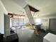 A garage featuring an attic access, roll up doors, and fluorescent lights at 22589 Nyack Ave, Port Charlotte, FL 33952