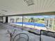 View of the screened-in pool area with an outdoor patio at 22589 Nyack Ave, Port Charlotte, FL 33952