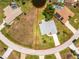 Aerial view of the property showcasing its location on a cul-de-sac and proximity to neighboring homes at 23 Bunker Cir, Rotonda West, FL 33947