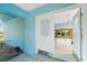 Inviting front entryway with glass-paneled door and tiled floor offering a glimpse of the interior at 23 Bunker Cir, Rotonda West, FL 33947