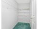 Walk-in closet featuring ample storage and wire shelving, ready for organization at 23 Bunker Cir, Rotonda West, FL 33947