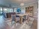 Spacious living room and dining area with seamless flow, perfect for entertaining with ample seating and natural light at 2590 Tarpon Cove Dr # 811, Punta Gorda, FL 33950
