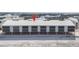 Bright, modern beach condominium complex with a metal roof and impact-resistant windows at 2700 N Beach Rd # B205, Englewood, FL 34223
