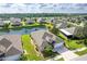 Expansive aerial view of a residential neighborhood featuring well-kept homes and lush green landscaping at 278 Crystal River Dr, Englewood, FL 34223