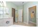 Bathroom with walk-in shower, vanity, and plenty of storage space at 278 Crystal River Dr, Englewood, FL 34223