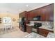 Kitchen showcasing modern appliances, granite countertops, and tile backsplash at 278 Crystal River Dr, Englewood, FL 34223