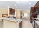 Kitchen featuring granite countertops, stainless steel appliances, and a breakfast nook at 278 Crystal River Dr, Englewood, FL 34223